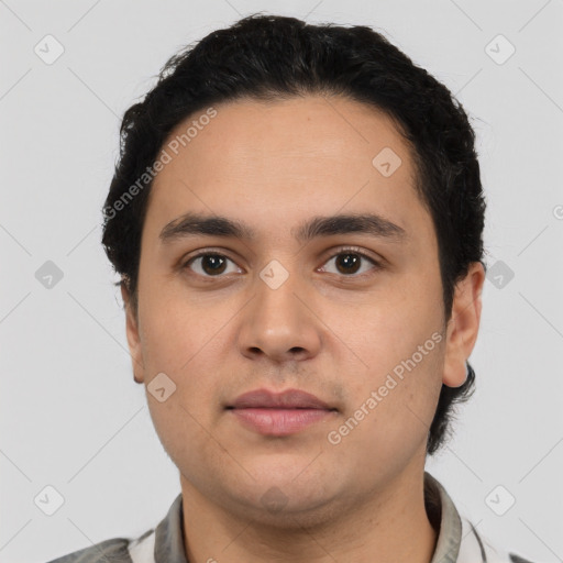 Neutral latino young-adult male with short  black hair and brown eyes