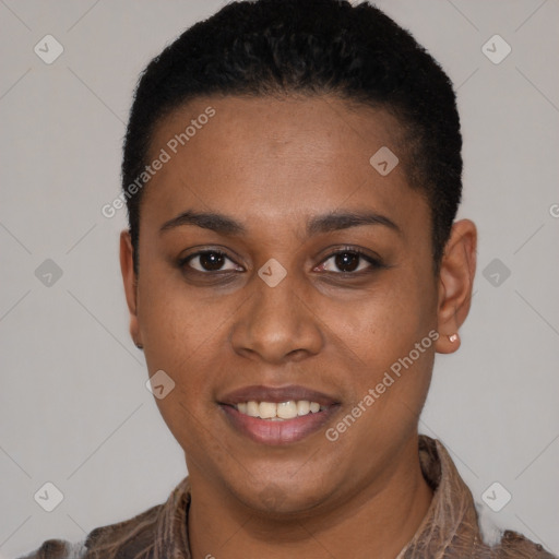 Joyful black young-adult female with short  brown hair and brown eyes