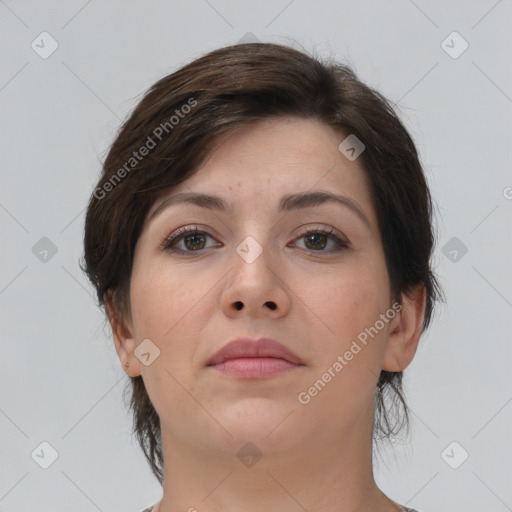 Neutral white young-adult female with medium  brown hair and brown eyes