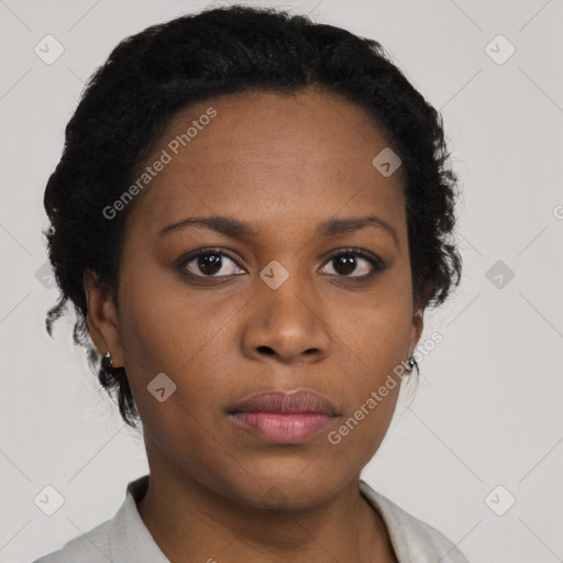 Neutral black young-adult female with short  brown hair and brown eyes