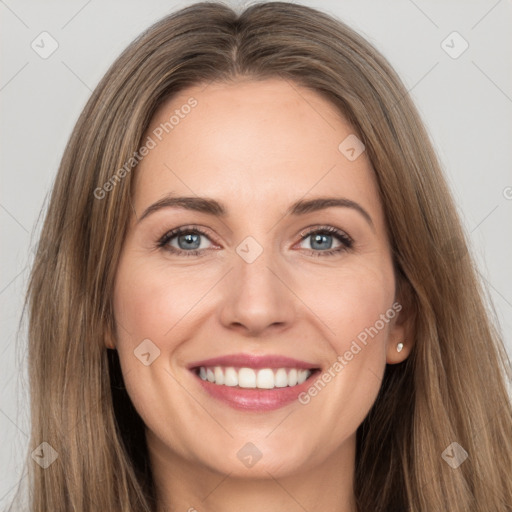 Joyful white young-adult female with long  brown hair and grey eyes