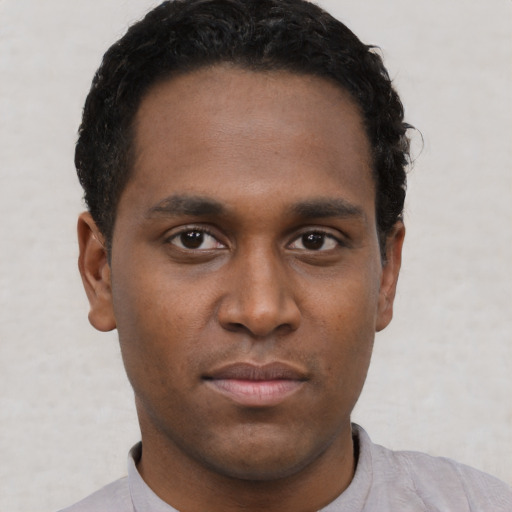 Neutral black young-adult male with short  brown hair and brown eyes