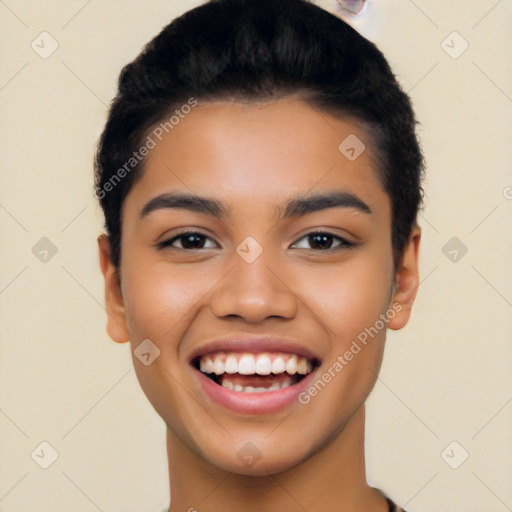 Joyful latino young-adult female with short  black hair and brown eyes