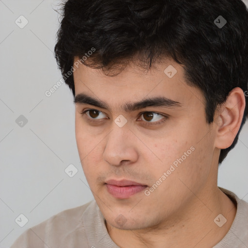 Neutral asian young-adult male with short  brown hair and brown eyes