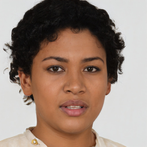 Neutral latino young-adult female with short  brown hair and brown eyes