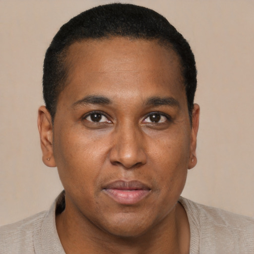 Neutral black young-adult male with short  brown hair and brown eyes