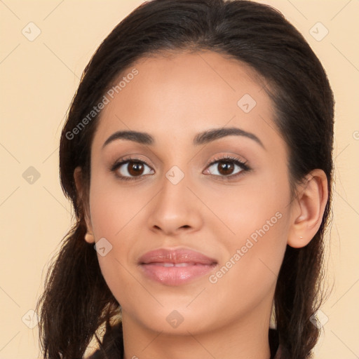 Joyful white young-adult female with long  brown hair and brown eyes