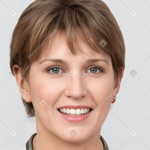 Joyful white young-adult female with short  brown hair and grey eyes