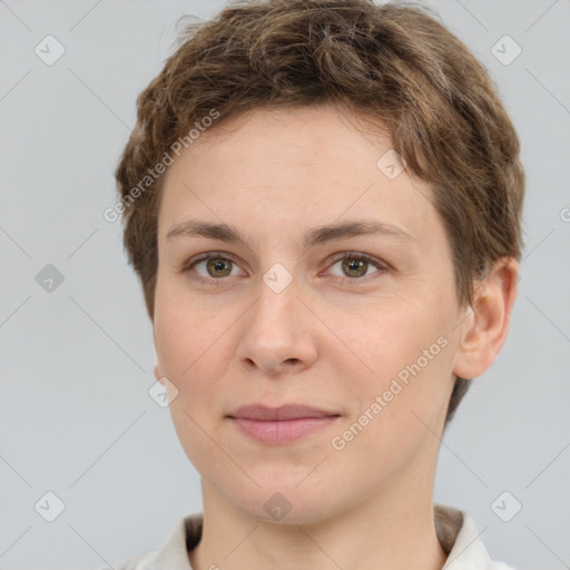 Joyful white young-adult female with short  brown hair and grey eyes