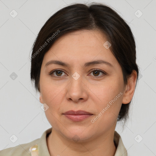 Joyful white adult female with medium  brown hair and brown eyes