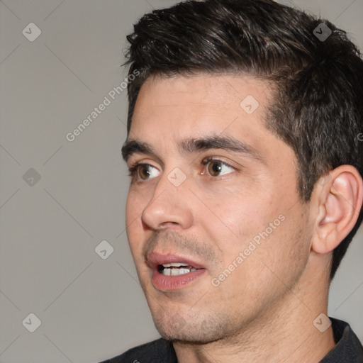 Joyful white young-adult male with short  black hair and brown eyes