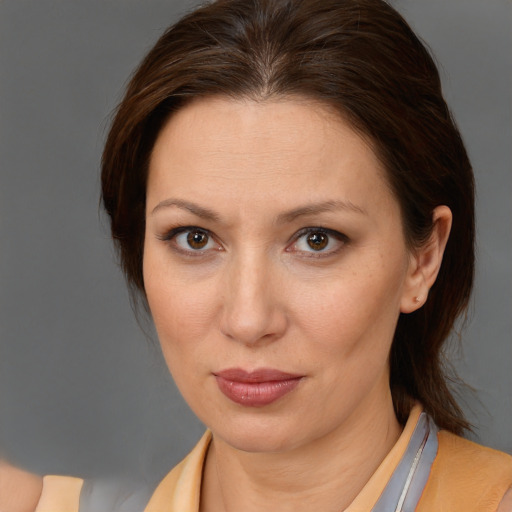 Neutral white adult female with medium  brown hair and brown eyes