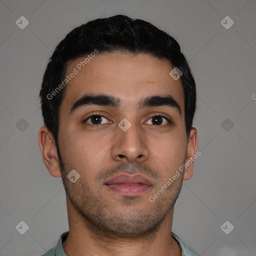 Neutral latino young-adult male with short  black hair and brown eyes