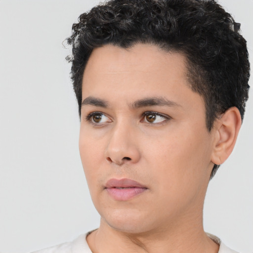 Neutral white young-adult male with short  black hair and brown eyes