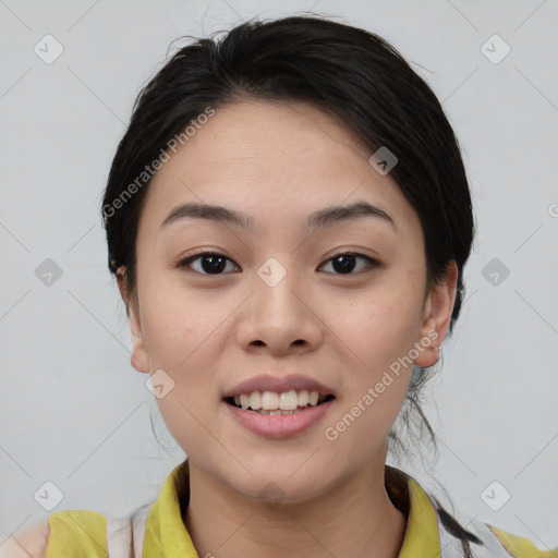 Joyful asian young-adult female with medium  brown hair and brown eyes