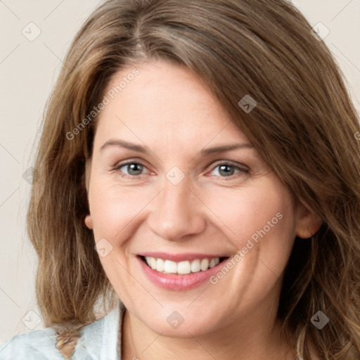 Joyful white young-adult female with medium  brown hair and green eyes