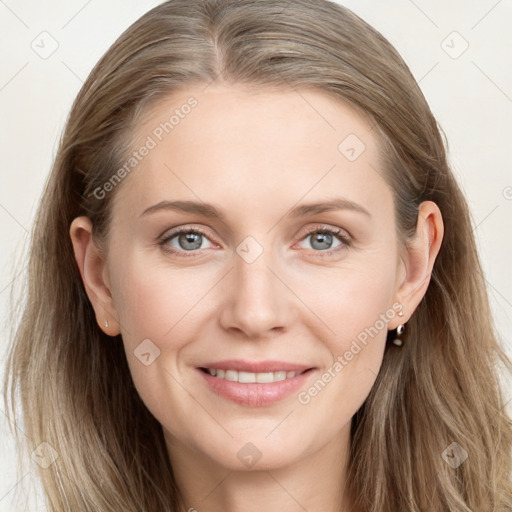 Joyful white young-adult female with long  brown hair and blue eyes