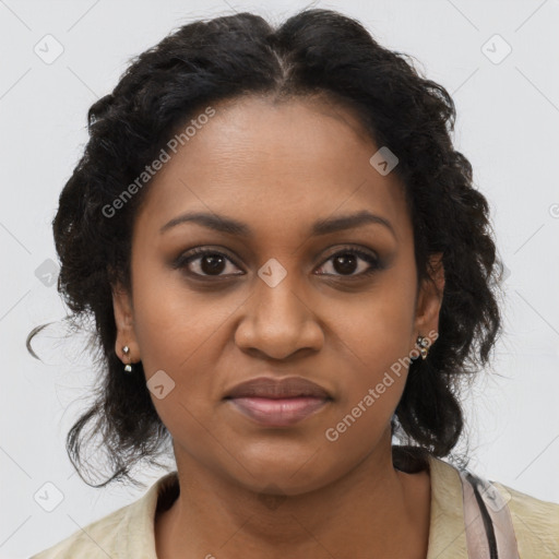 Joyful black young-adult female with long  brown hair and brown eyes