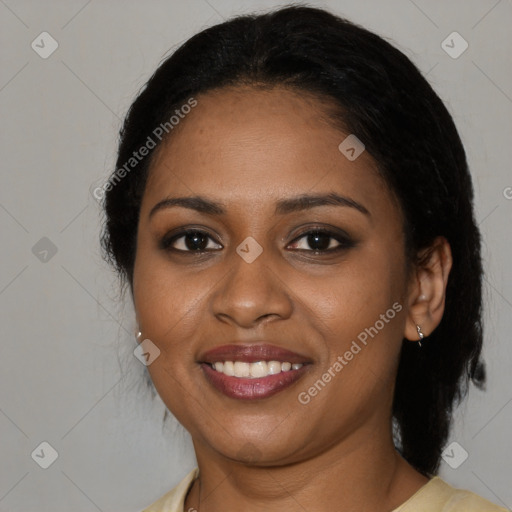 Joyful black young-adult female with medium  brown hair and brown eyes