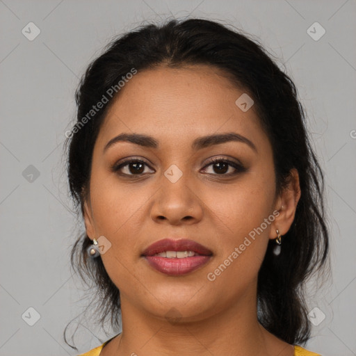 Joyful latino young-adult female with medium  brown hair and brown eyes