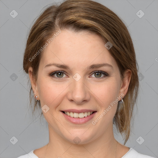 Joyful white young-adult female with medium  brown hair and blue eyes