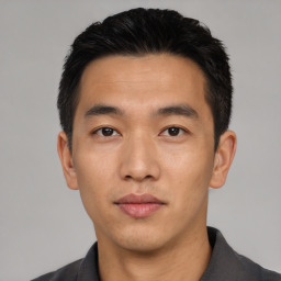 Neutral asian young-adult male with short  black hair and brown eyes