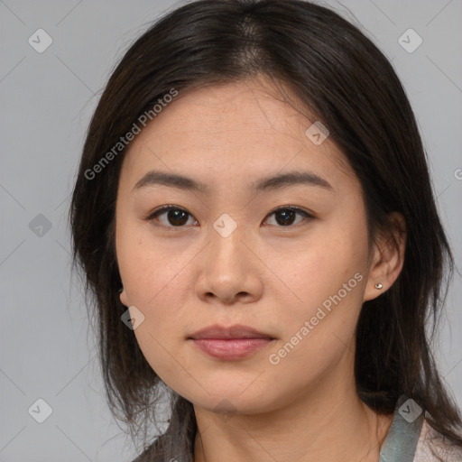 Neutral asian young-adult female with medium  brown hair and brown eyes