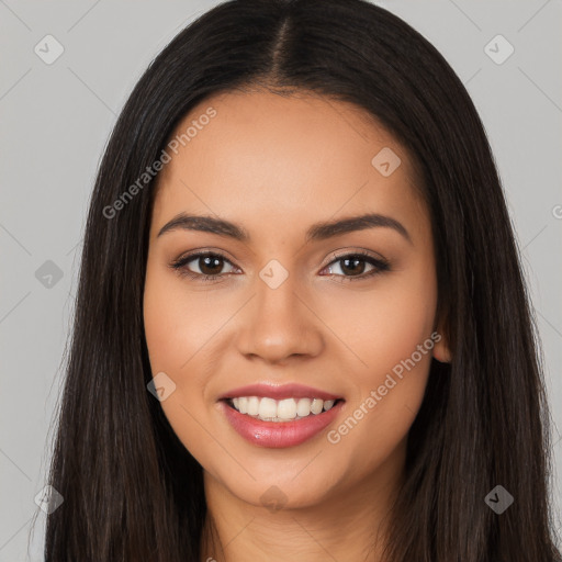 Joyful latino young-adult female with long  black hair and brown eyes