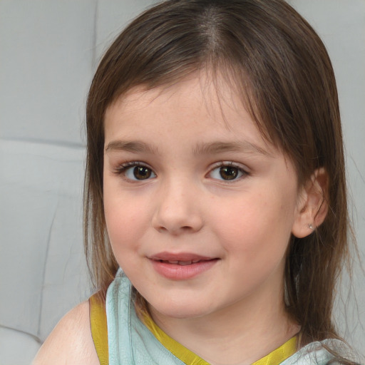 Joyful white child female with medium  brown hair and brown eyes