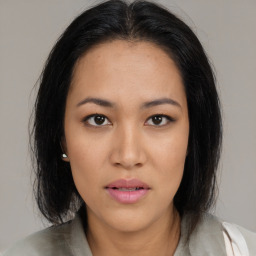 Neutral asian young-adult female with medium  black hair and brown eyes