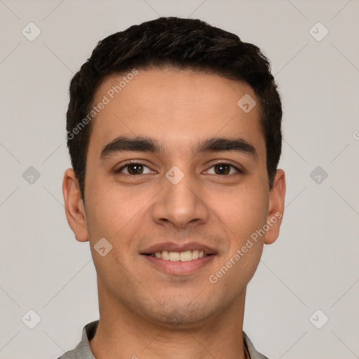 Joyful white young-adult male with short  black hair and brown eyes