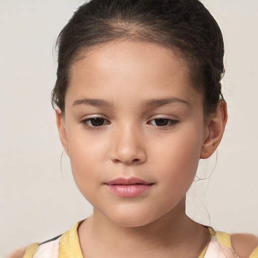 Joyful white child female with short  brown hair and brown eyes