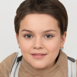 Joyful white child female with short  brown hair and brown eyes