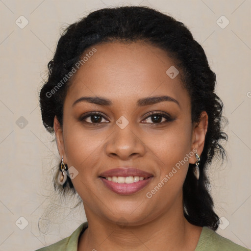 Joyful black young-adult female with long  black hair and brown eyes