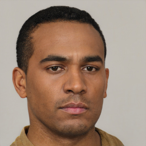Neutral latino young-adult male with short  brown hair and brown eyes