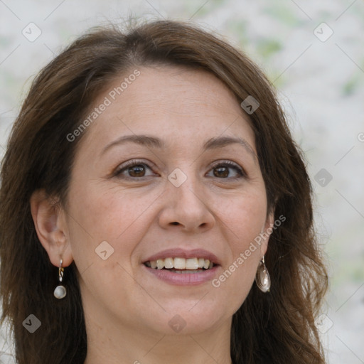 Joyful white adult female with long  brown hair and brown eyes