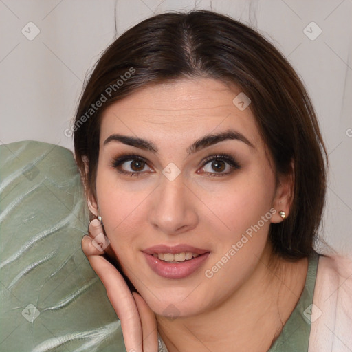 Joyful white young-adult female with medium  brown hair and brown eyes