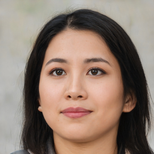 Neutral latino young-adult female with long  brown hair and brown eyes