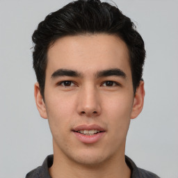 Neutral asian young-adult male with short  black hair and brown eyes