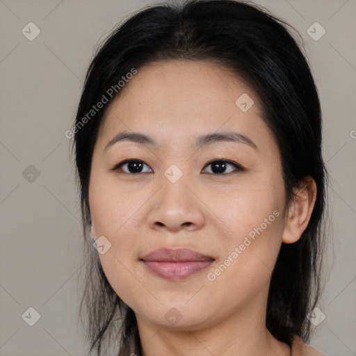 Joyful asian young-adult female with medium  brown hair and brown eyes