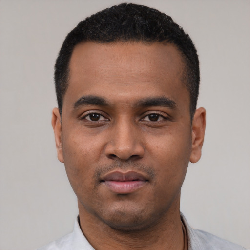 Neutral black young-adult male with short  black hair and brown eyes