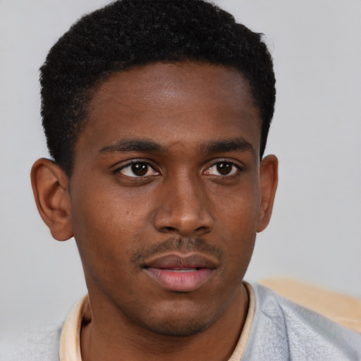 Neutral black young-adult male with short  brown hair and brown eyes