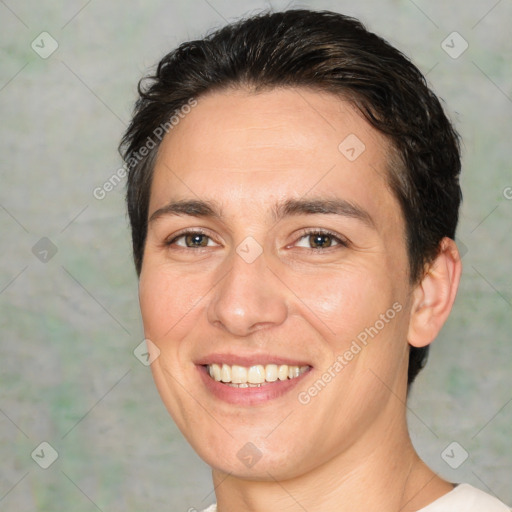 Joyful white adult female with short  brown hair and brown eyes