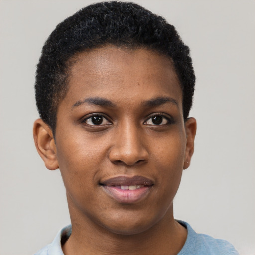 Joyful black young-adult female with short  black hair and brown eyes