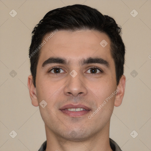 Joyful white young-adult male with short  black hair and brown eyes