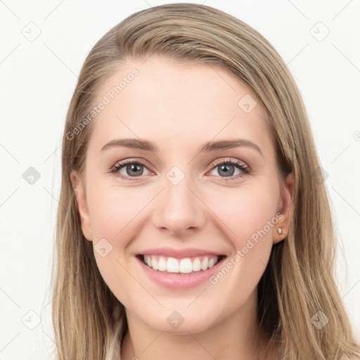 Joyful white young-adult female with long  brown hair and grey eyes