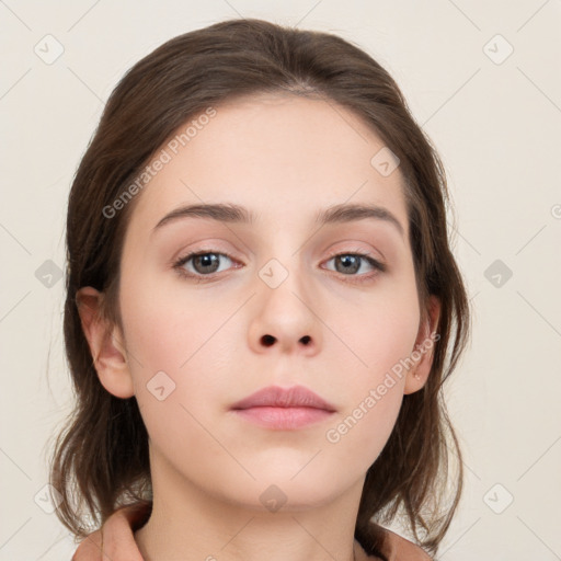 Neutral white young-adult female with medium  brown hair and grey eyes