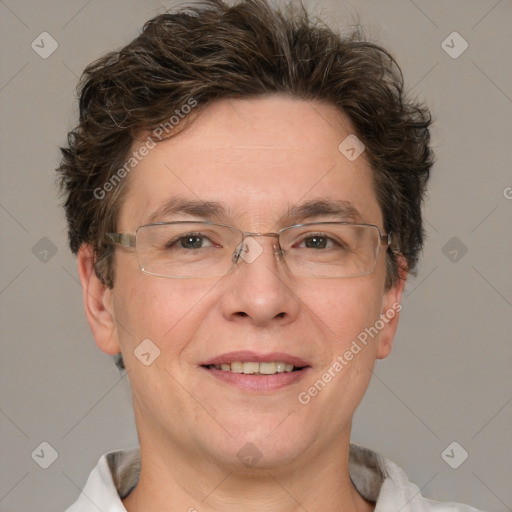 Joyful white adult male with short  brown hair and grey eyes