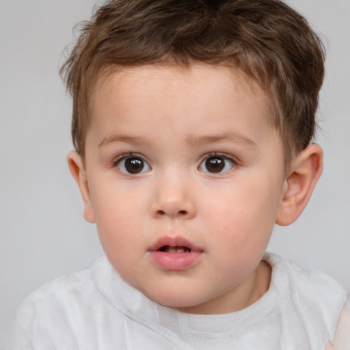 Neutral white child male with short  brown hair and brown eyes