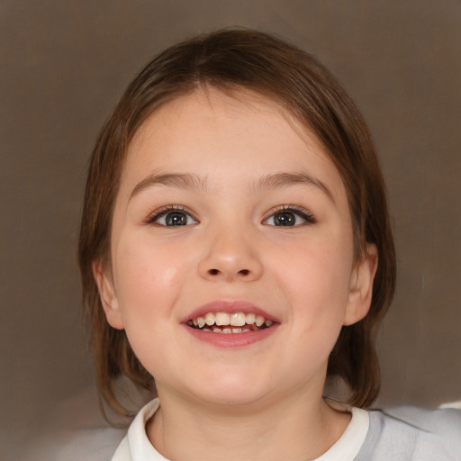 Joyful white child female with medium  brown hair and brown eyes